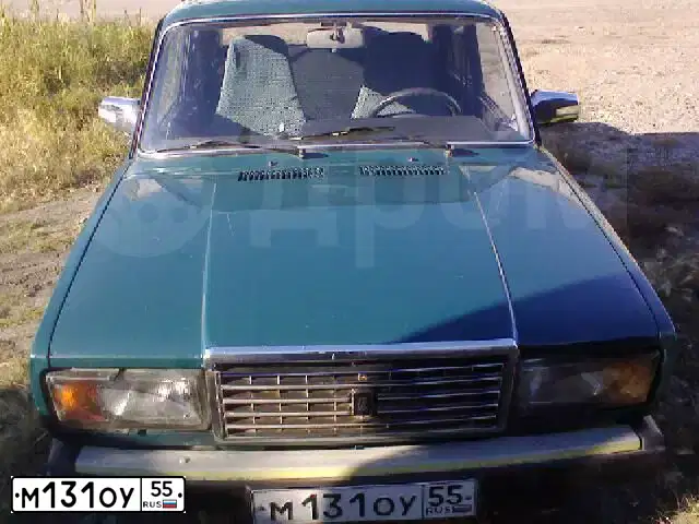 Фото автомобиля LADA 2107, 2005 — госномер М131ОУ55. Цвет: СИНЕ-ЗЕЛЕНЫЙ