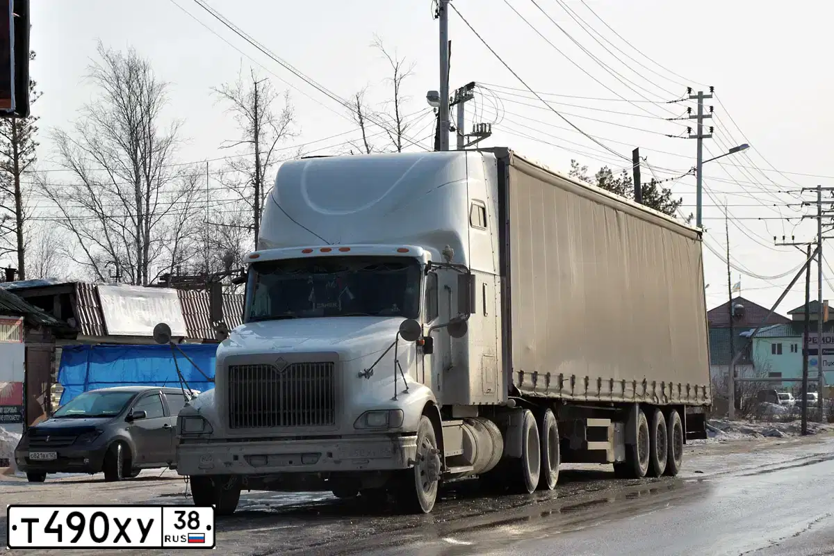 Фото автомобиля INTERNATIONAL HEAVY TRUCK 8500-9900, 1998 — госномер Т490ХУ49. Цвет: БЕЛЫЙ