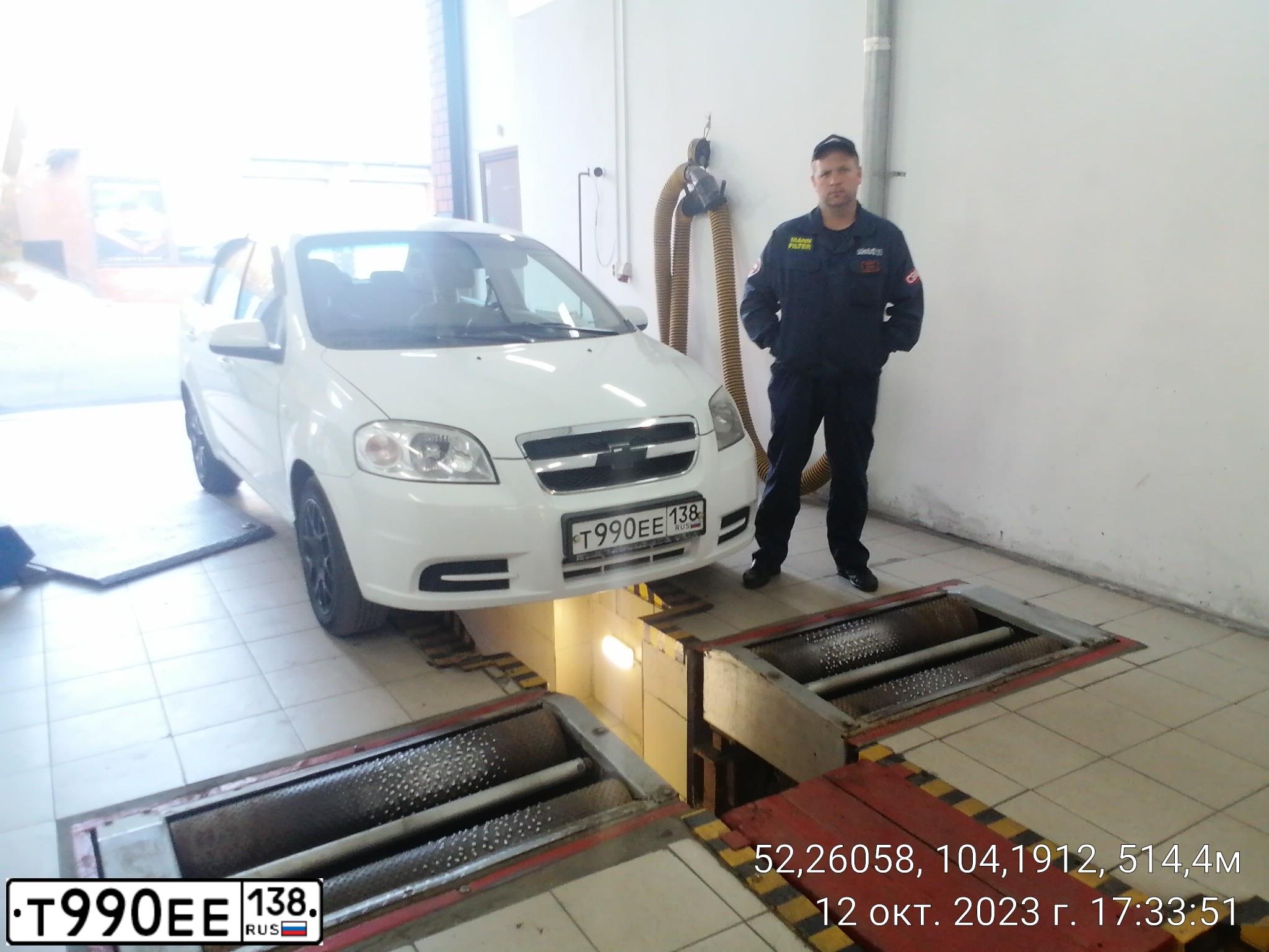 Фото автомобиля CHEVROLET AVEO, 2011 — госномер Т990ЕЕ138. Цвет: Белый