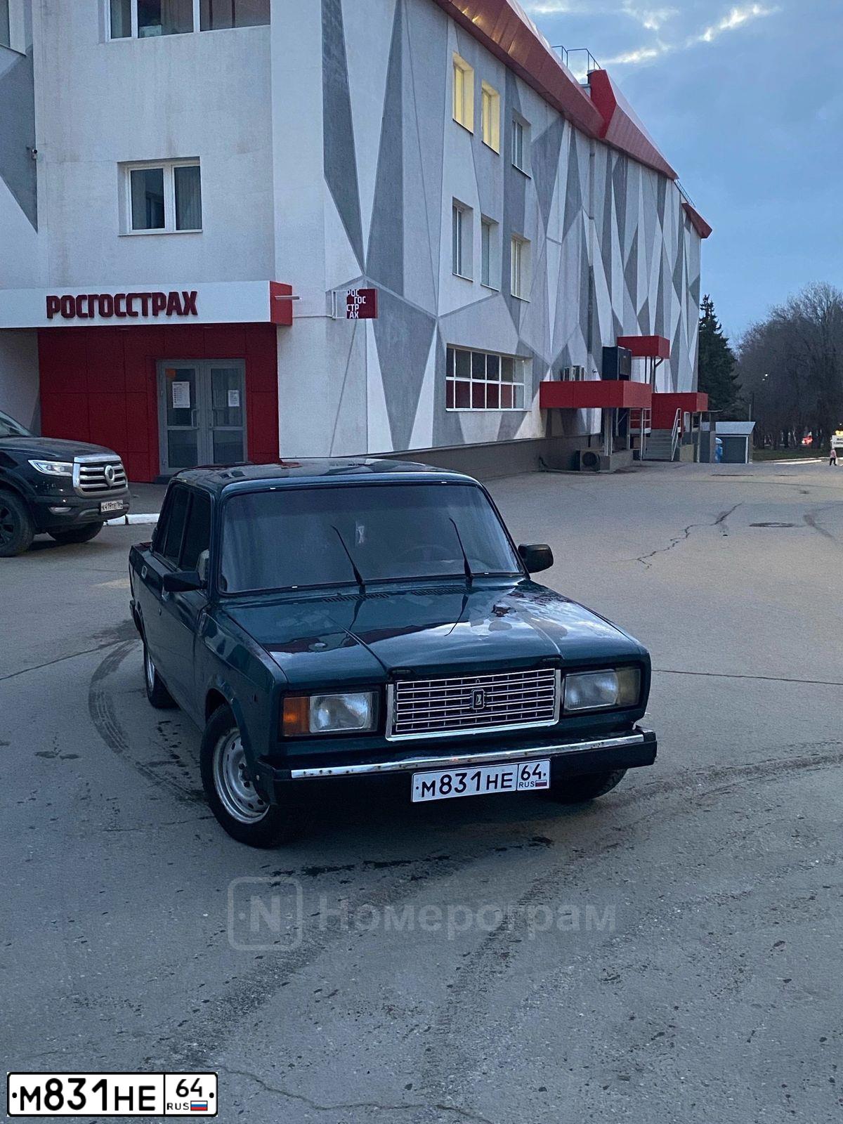 Фото автомобиля LADA 2107, 2006 — госномер М831НЕ64. Цвет: СИНЕ ЗЕЛЕНЫЙ