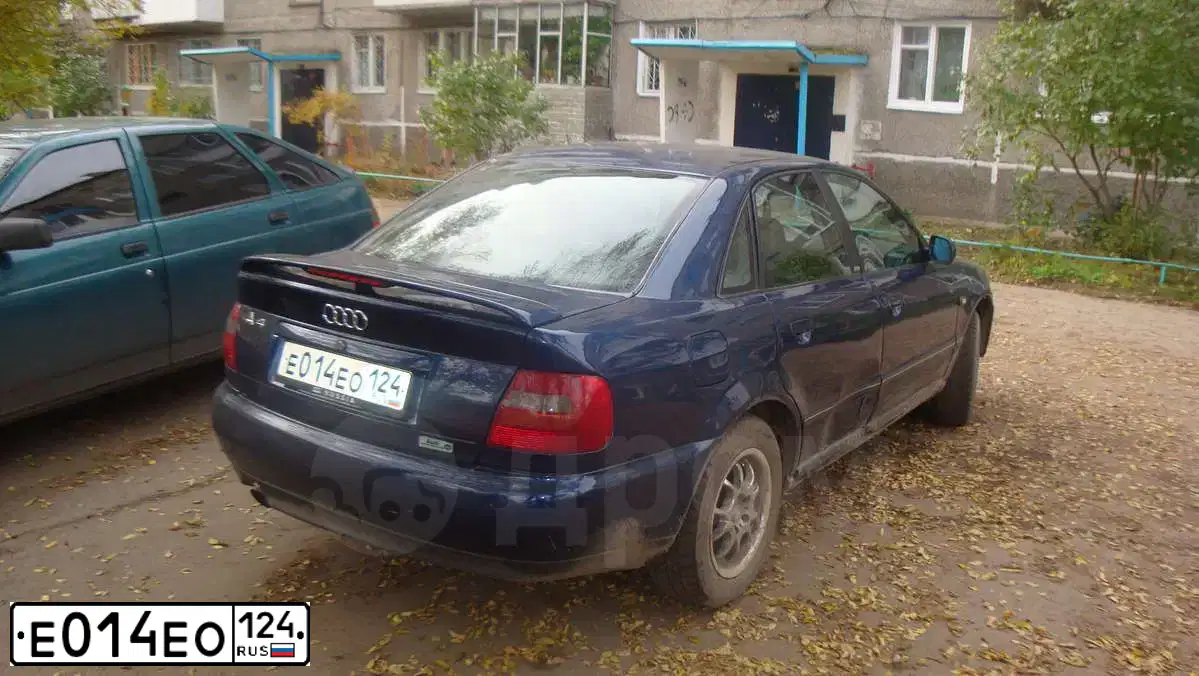 Фото автомобиля AUDI A4, 1998 — госномер К052ТА42. Цвет: Темно-синий