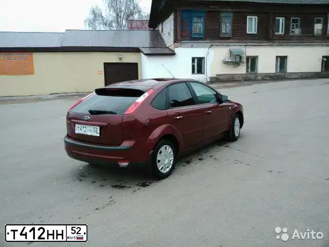 Фото автомобиля FORD FOCUS, 2007 — госномер Н274УВ152. Цвет: ТЕМНО-КРАСНЫЙ