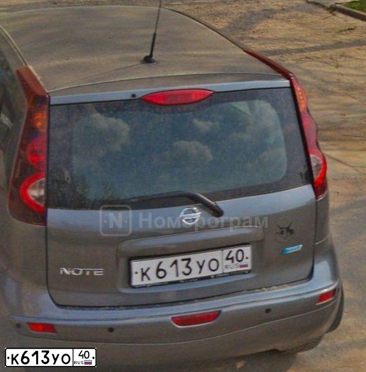 Фото автомобиля NISSAN NOTE, 2011 — госномер О282ЕС40. Цвет: СЕРЫЙ