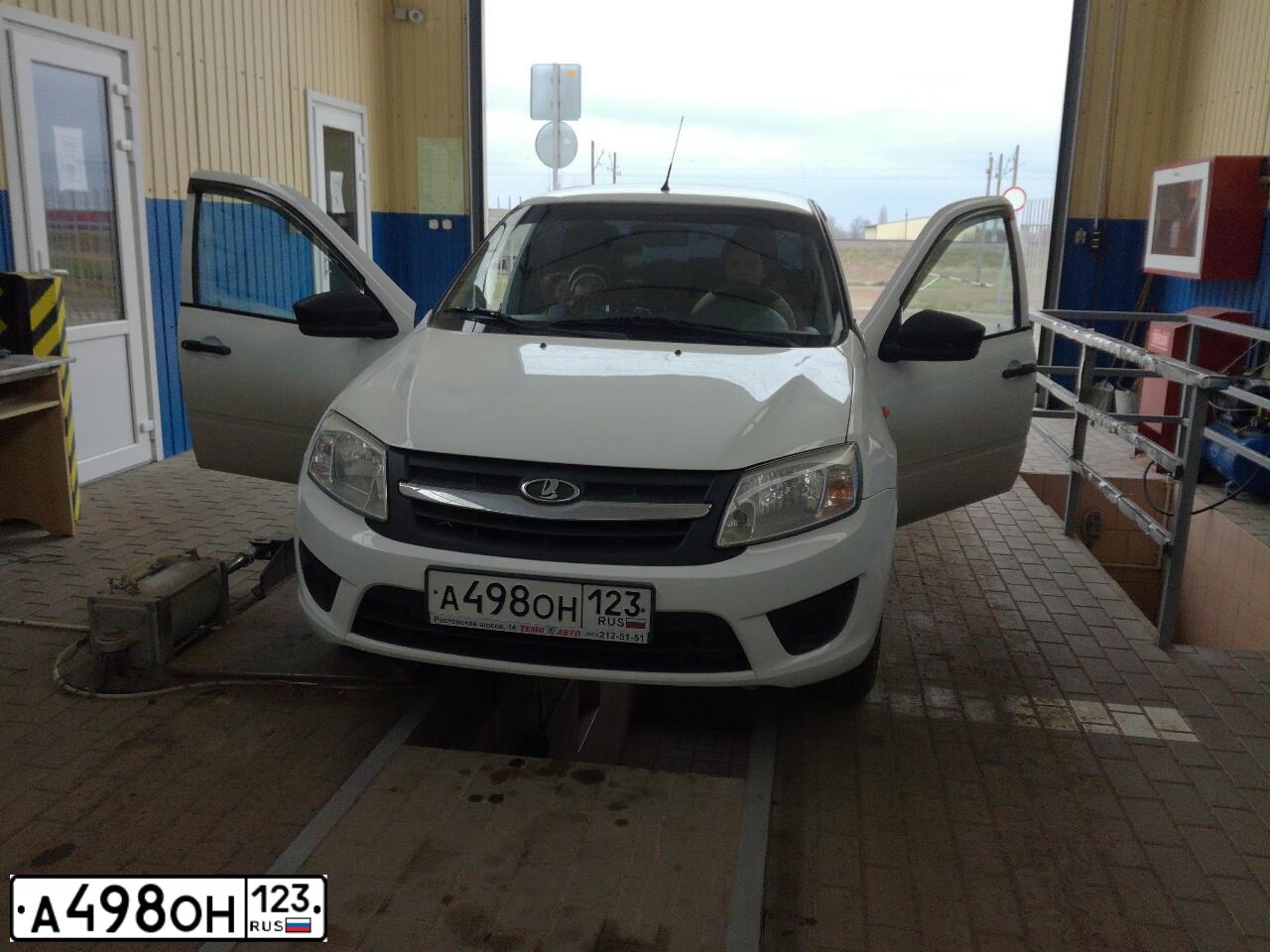 Фото автомобиля LADA 2190 GRANTA, 2014 — госномер А498ОН123. Цвет: Белый