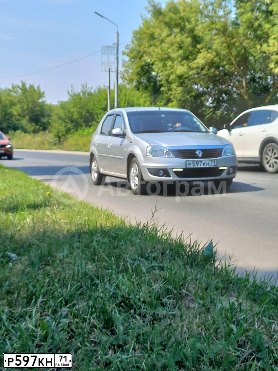 Фото автомобиля RENAULT LOGAN, 2014 — госномер Р597КН71. Цвет: СВЕТЛО-СЕРЫЙ