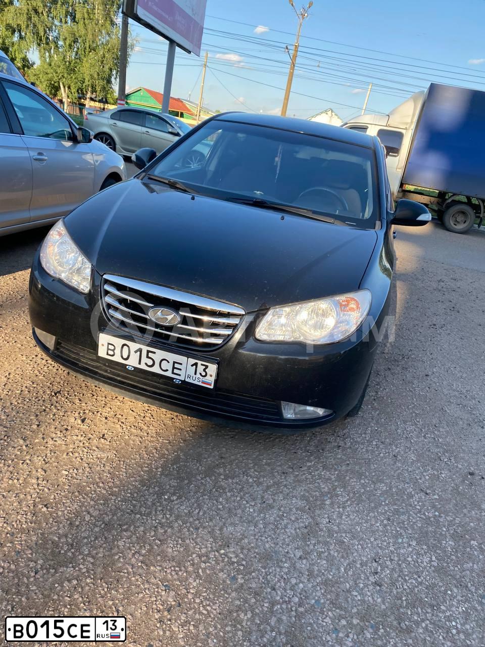 Фото автомобиля HYUNDAI ELANTRA, 2010 — госномер В015СЕ13. Цвет: ЧЕРНЫЙ
