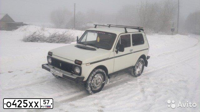 Фото автомобиля LADA 2121 NIVA, 1997 — госномер М460ММ57. Цвет: Белый