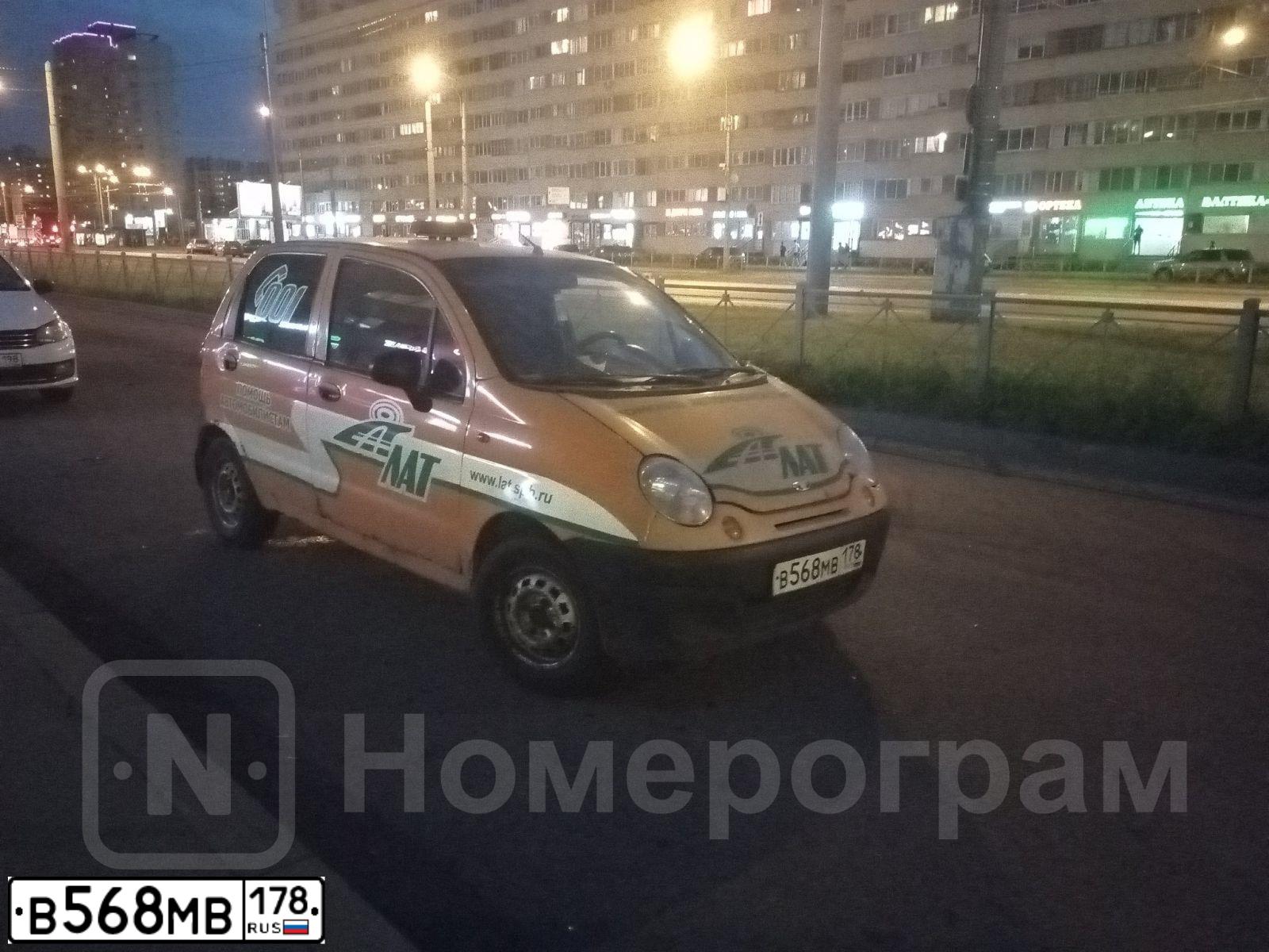 Фото автомобиля DAEWOO MATIZ, 2012 — госномер В568МВ178. Цвет: Оранжевый
