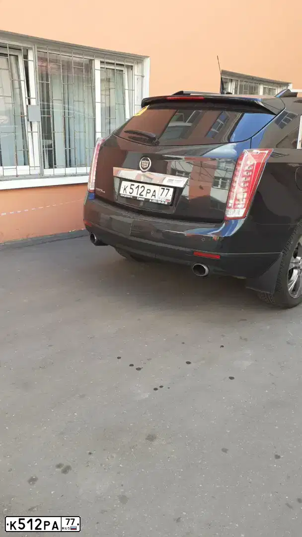 Фото автомобиля CADILLAC SRX, 2011 — госномер К512РА77. Цвет: ЧЕРНЫЙ