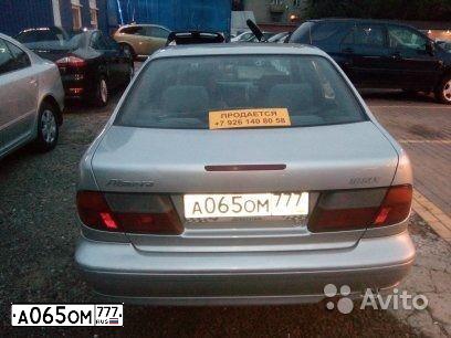 Фото автомобиля NISSAN ALMERA, 1998 — госномер Е167МВ03. Цвет: Серебристый