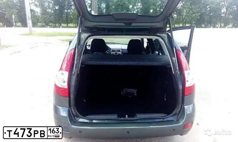 Фото автомобиля LADA 2171 PRIORA, 2011 — госномер Е156ТА123. Цвет: СЕРО-СИНЕ-ЗЕЛЕНЫЙ