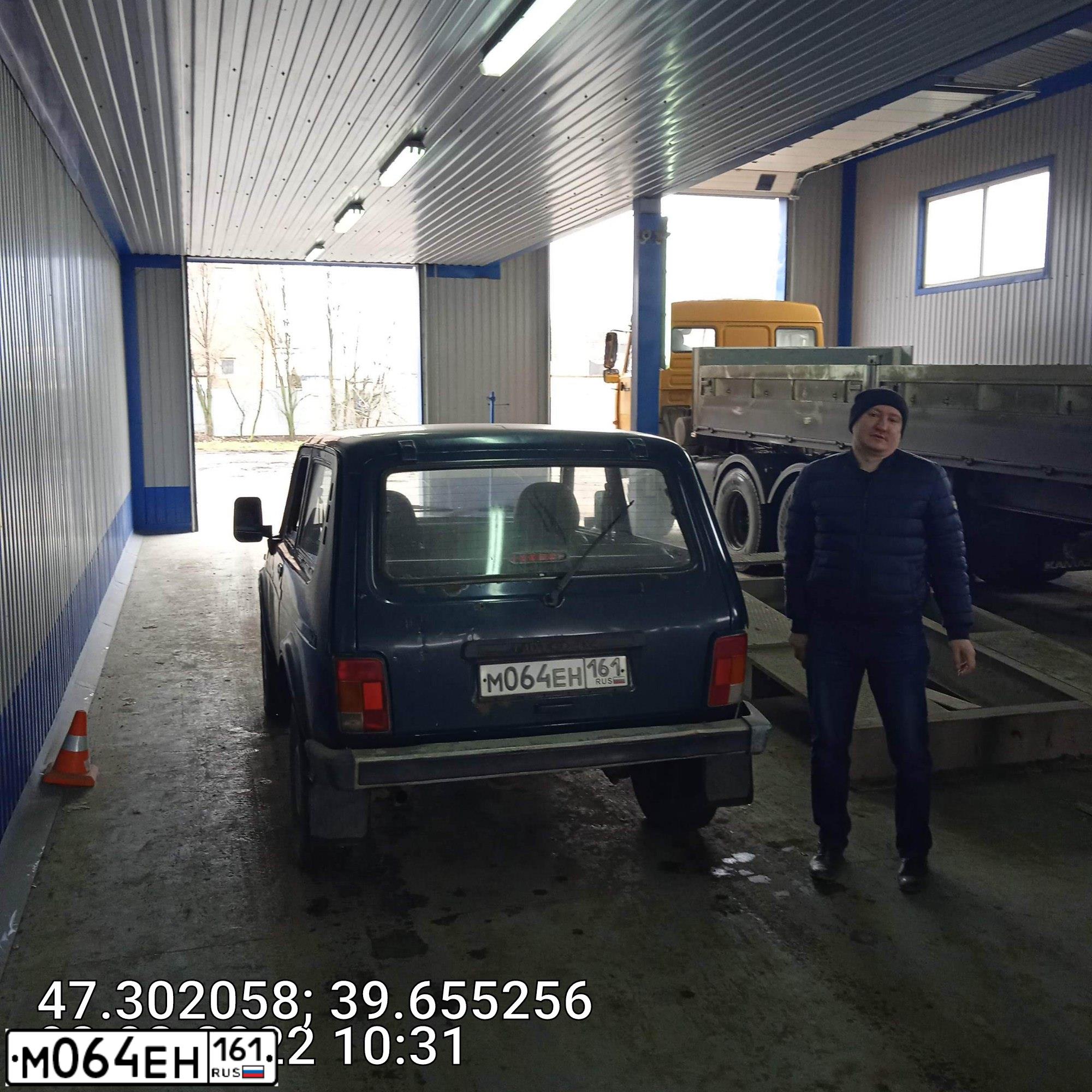 Фото автомобиля LADA 2121 NIVA, 2009. Цвет: Т.ЗЕЛЕНЫЙ