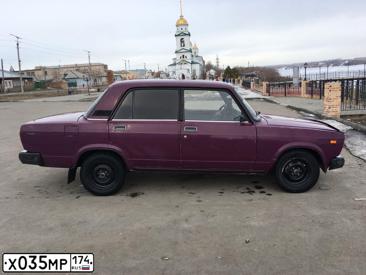 Фото автомобиля LADA 2107, 2002 — госномер Х035МР174. Цвет: ФИОЛЕТОВЫЙ