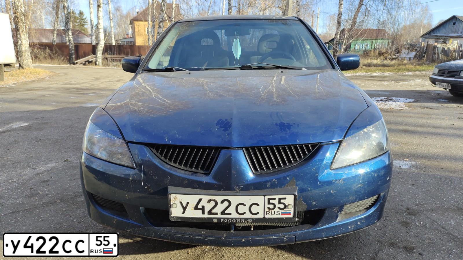 Фото автомобиля MITSUBISHI LANCER, 2005 — госномер У422СС55. Цвет: синий