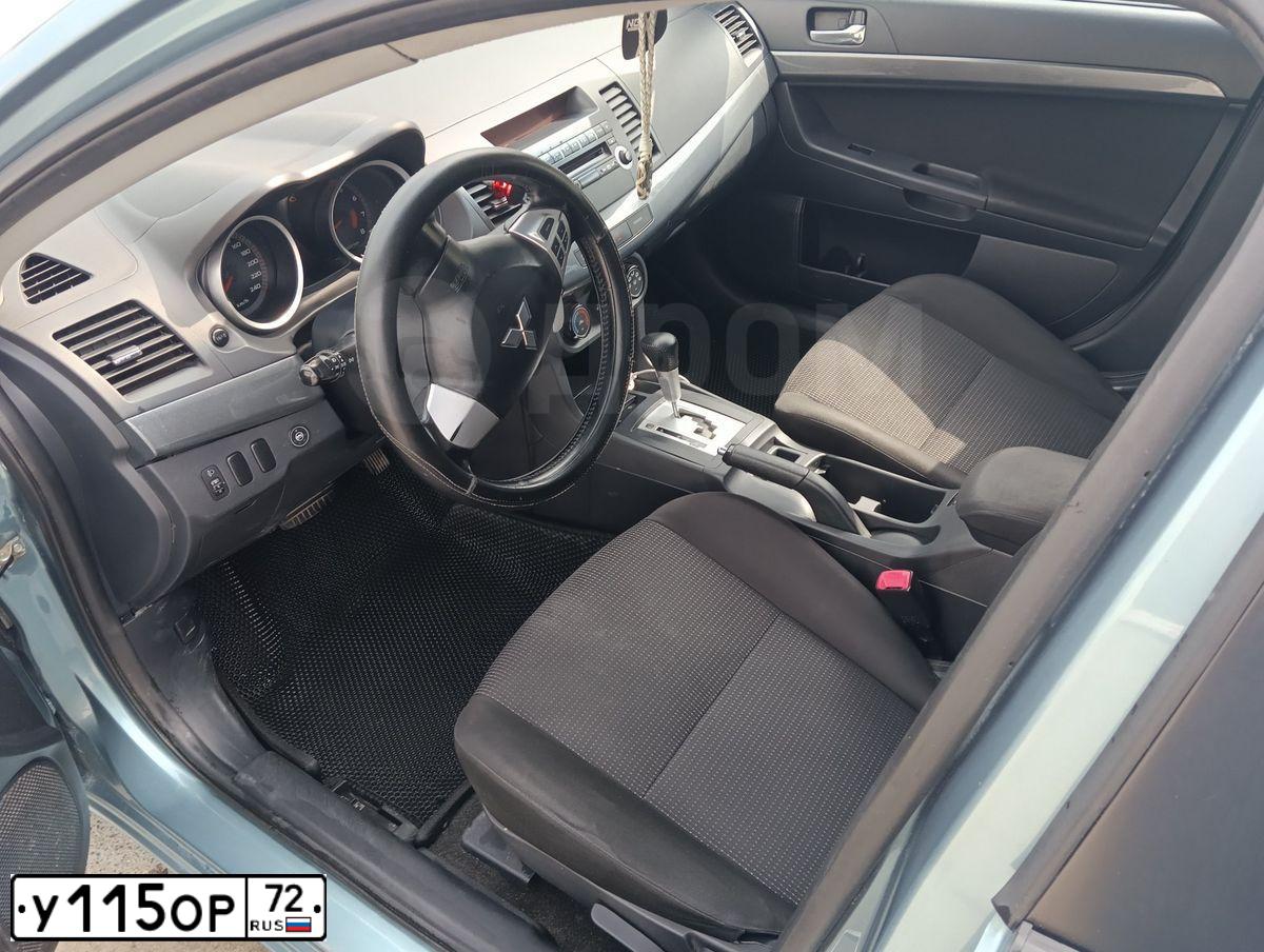 Фото автомобиля MITSUBISHI LANCER, 2008 — госномер У115ОР72. Цвет: СВЕТЛО-СЕРО-ЗЕЛЕНЫЙ