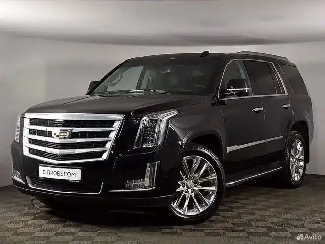 Фото автомобиля CADILLAC ESCALADE, 2019 — госномер О518ТН799. Цвет: ЧЕРНЫЙ
