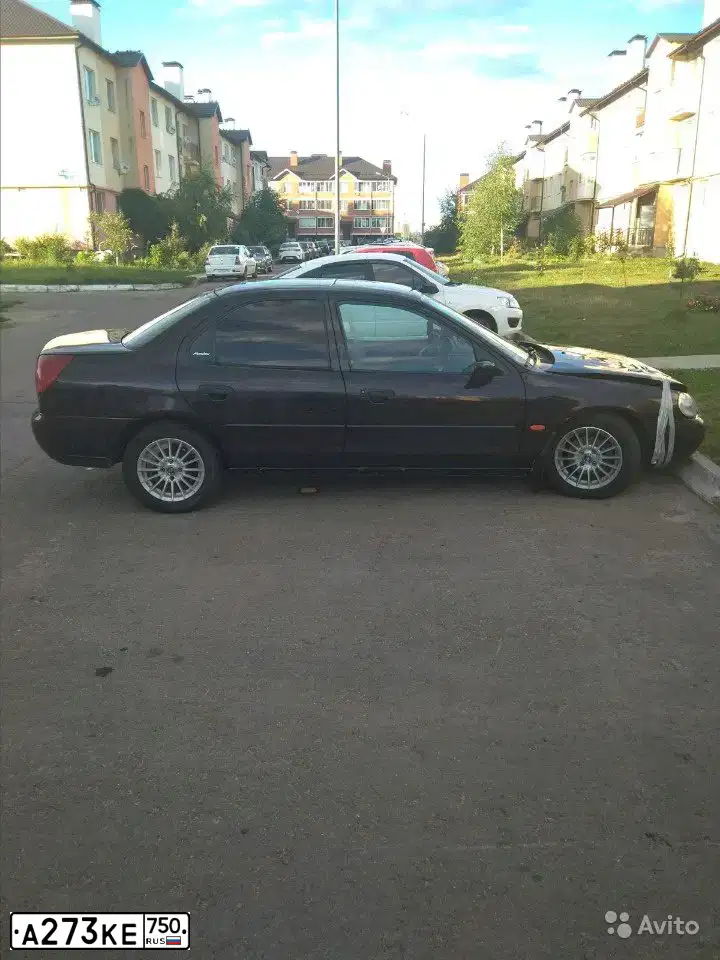 Фото автомобиля FORD MONDEO, 1997 — госномер Р799СМ750. Цвет: ФИОЛЕТОВЫЙ