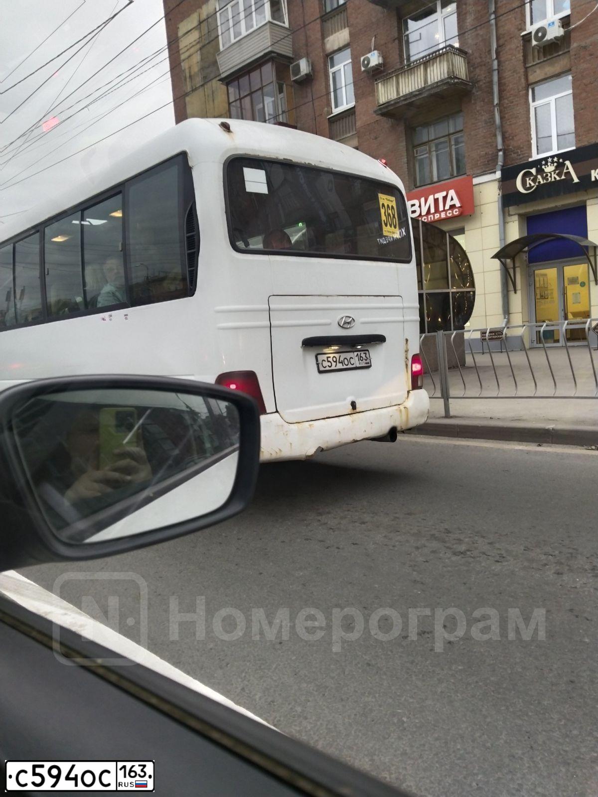Фото автомобиля HYUNDAI COUNTY, 2012 — госномер С594ОС163. Цвет: Белый
