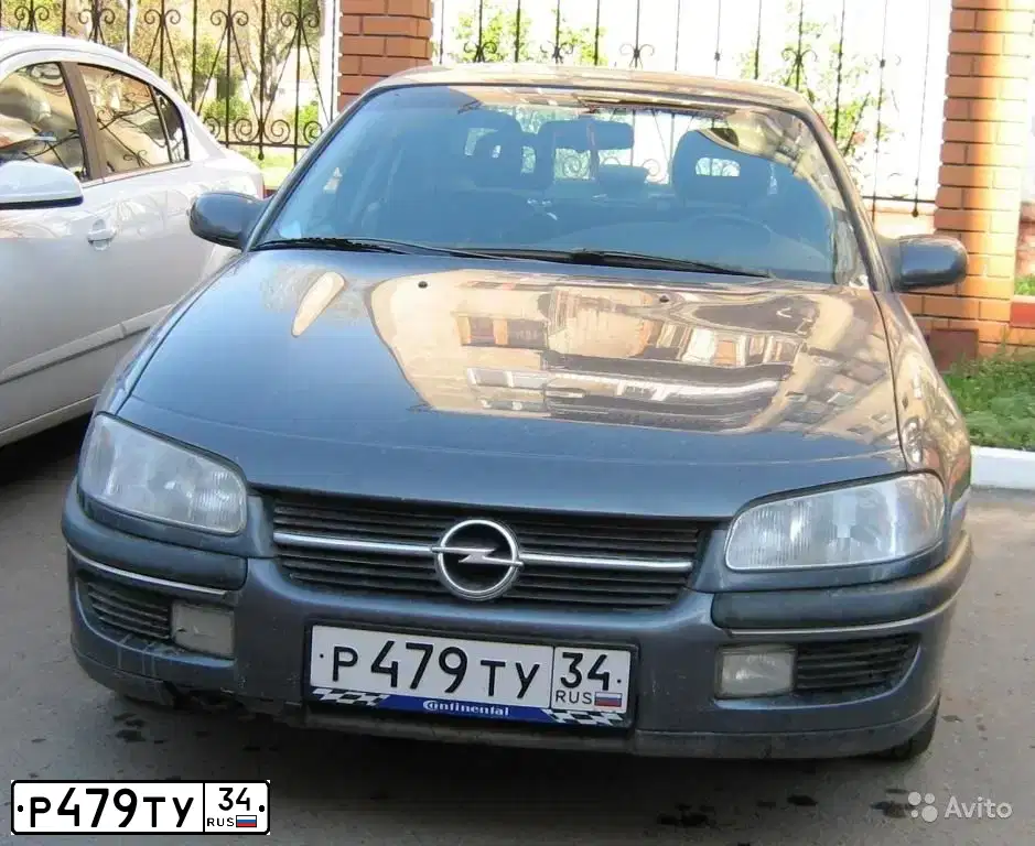 Фото автомобиля OPEL OMEGA, 1997 — госномер Н371НУ69. Цвет: Серый