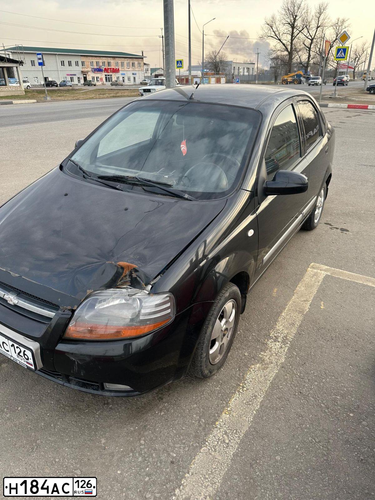 Фото автомобиля CHEVROLET AVEO, 2006 — госномер У329ЕР180. Цвет: ЧЕРНЫЙ