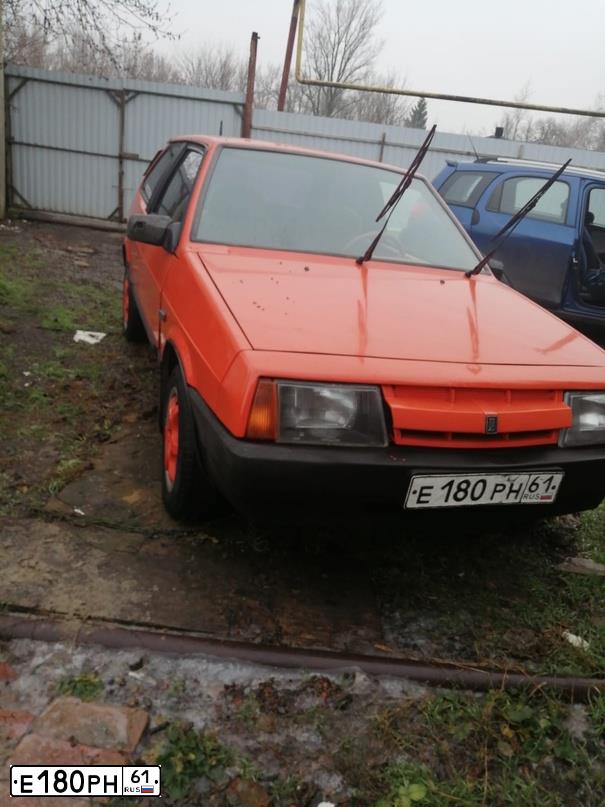 Фото автомобиля LADA 2108 SAMARA, 1987 — госномер Е180РН61. Цвет: Оранжевый