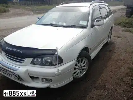 Фото автомобиля SSANGYONG KYRON, 2009 — госномер Н885ХК38. Цвет: ЧЕРНЫЙ