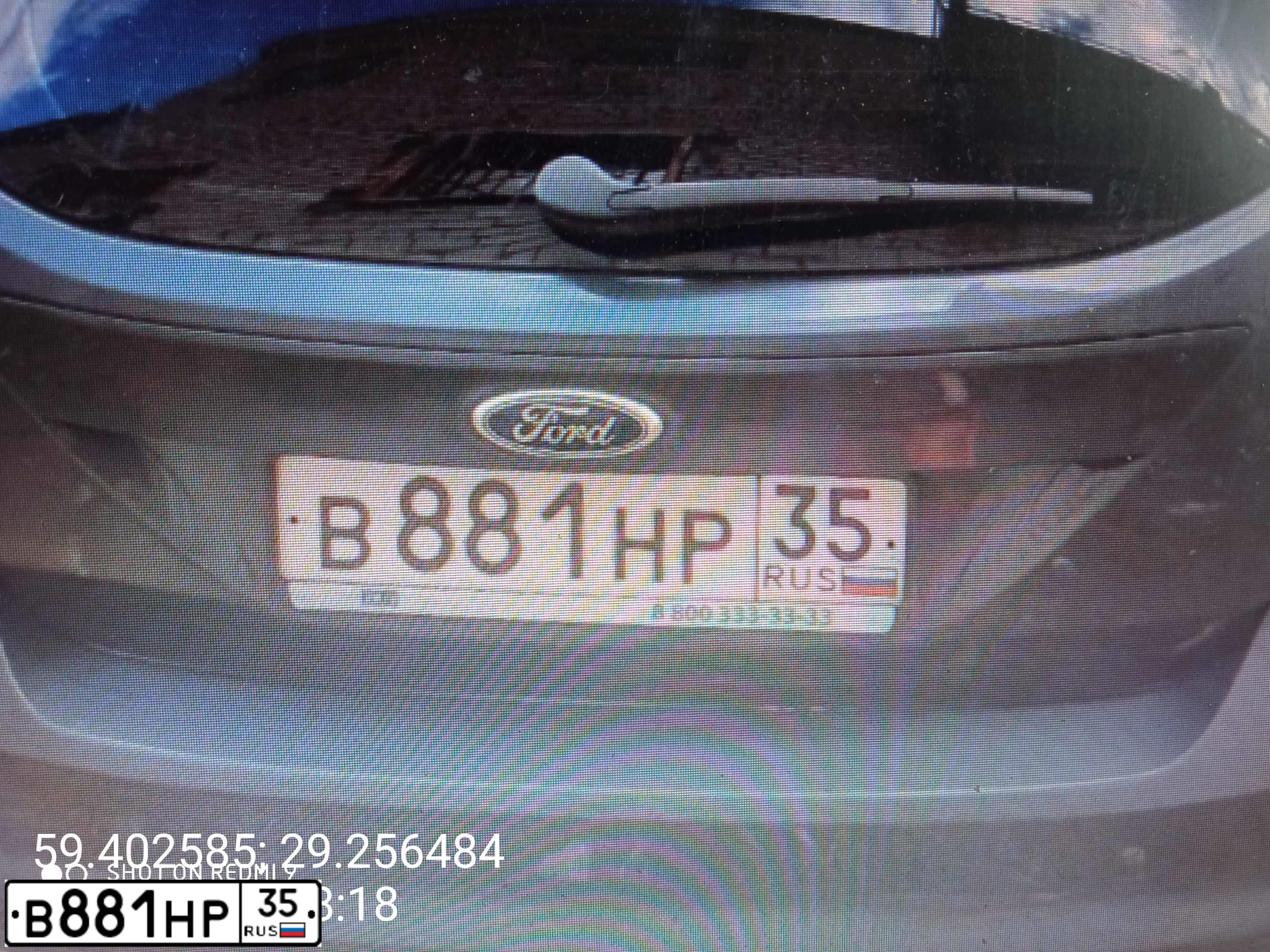 Фото автомобиля FORD FOCUS, 2011 — госномер В881НР35. Цвет: ТЕМНО-СЕРЫЙ
