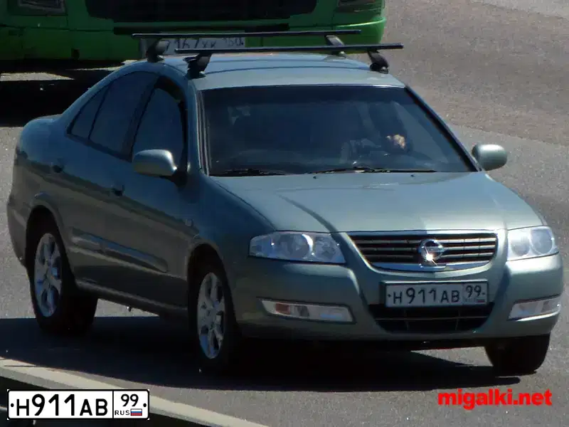Фото автомобиля NISSAN ALMERA, 2006 — госномер Н911АВ99. Цвет: СЕРЫЙ
