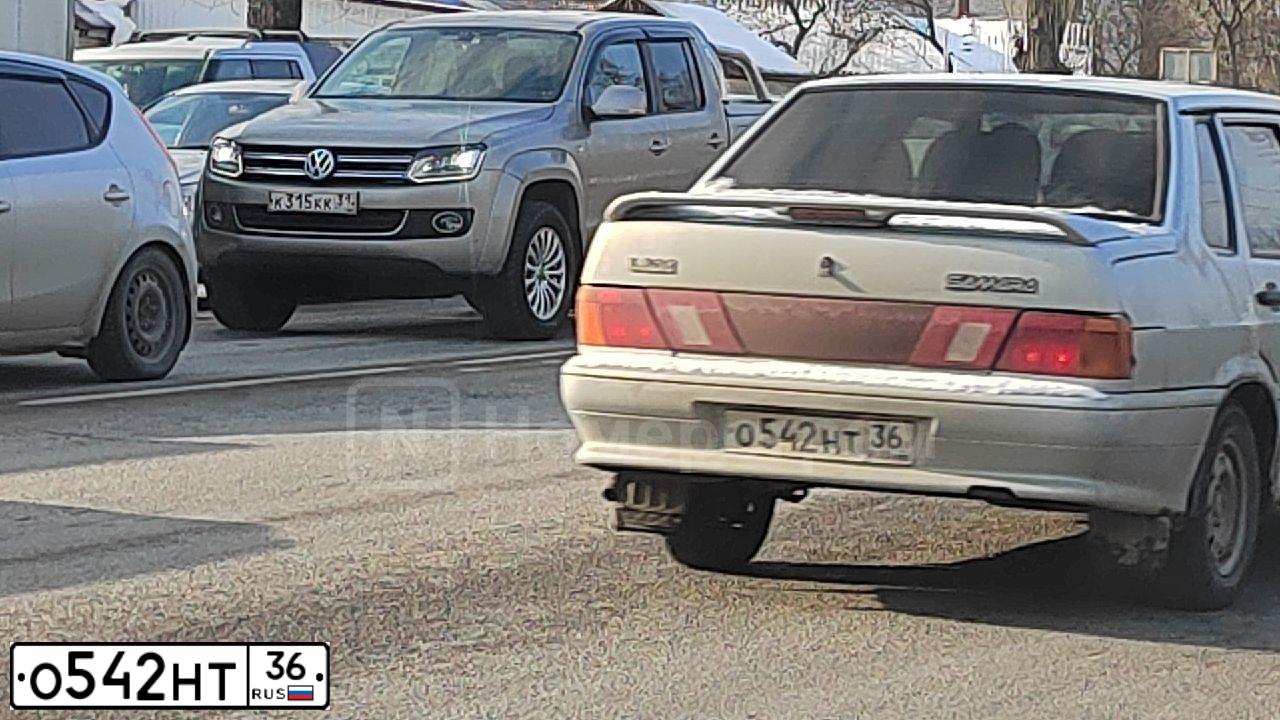 Фото автомобиля LADA 2115 SAMARA, 2007 — госномер У304ОК31. Цвет: СЕРЕБРИСТО-ЖЕЛТО-ГОЛУБОЙ