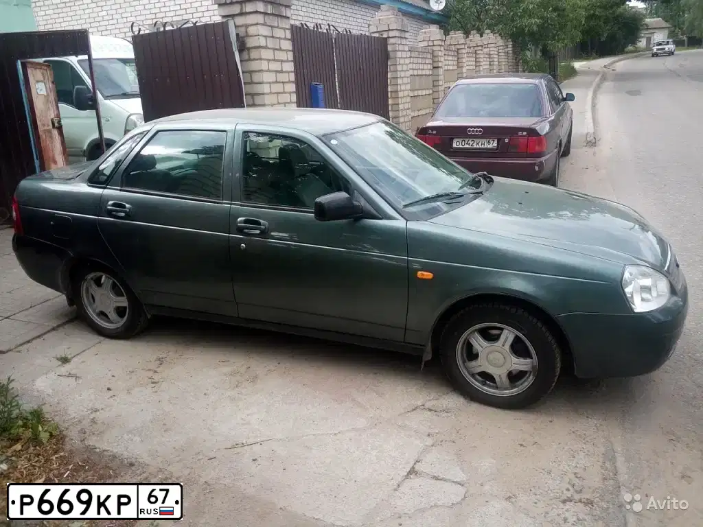 Фото автомобиля LADA 2170 PRIORA, 2009 — госномер Н836СС32. Цвет: СЕРО-СИНЕ ЗЕЛЕНЫЙ