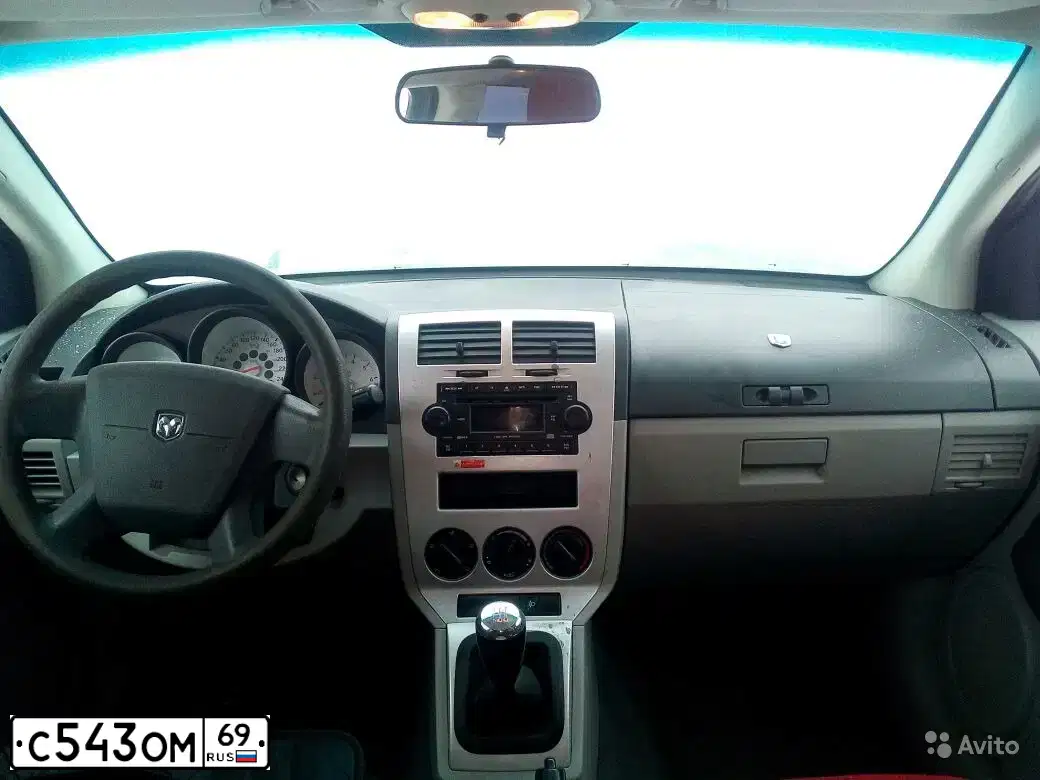 Фото автомобиля DODGE CALIBER, 2007 — госномер Н205ТО35. Цвет: ОРАНЖЕВО-ЗОЛОТИСТЫЙ