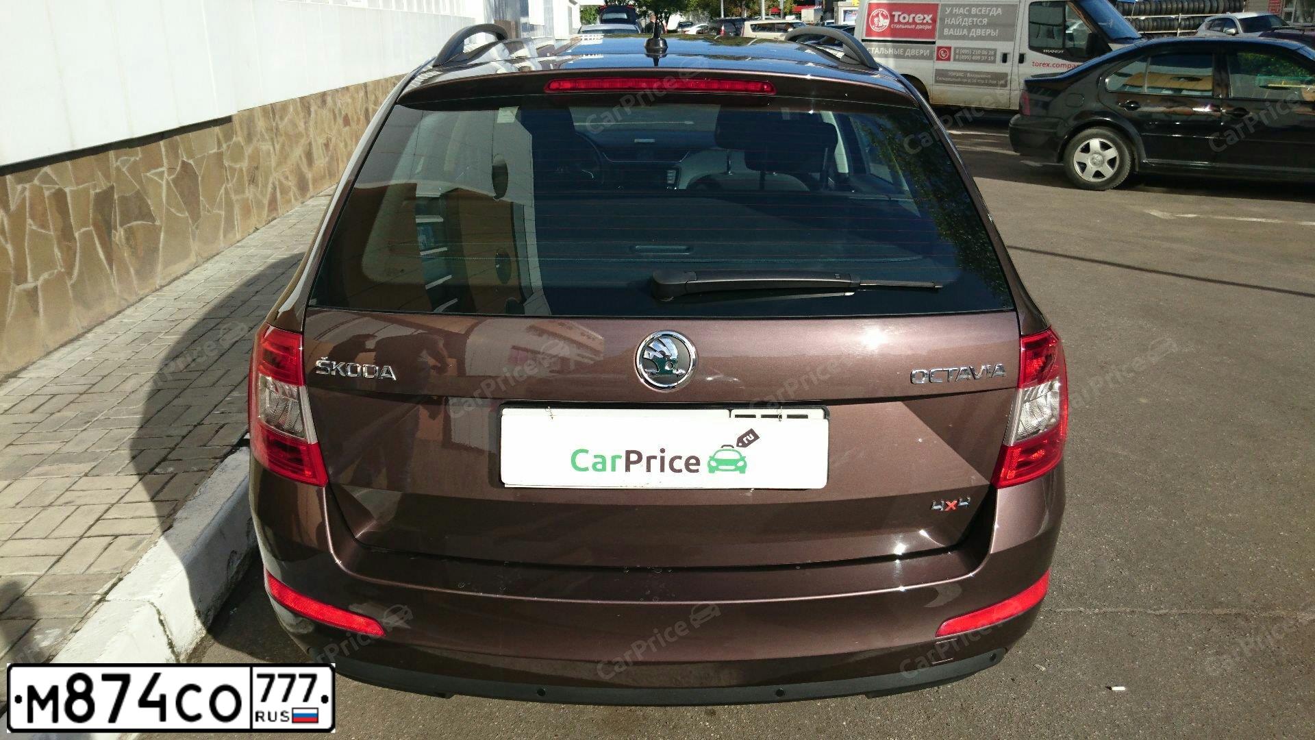 Фото автомобиля SKODA OCTAVIA, 2014 — госномер К101ВО977. Цвет: БЕЛЫЙ ЖЕЛТЫЙ СЕРЫЙ