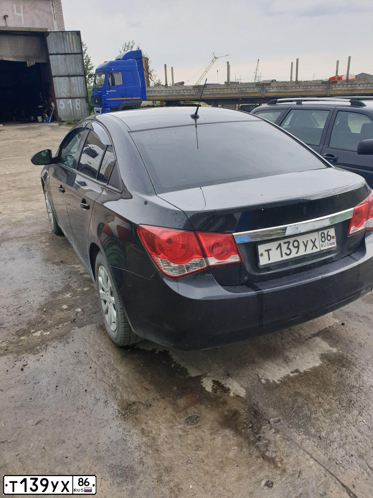 Фото автомобиля CHEVROLET CRUZE, 2011 — госномер А258МУ45. Цвет: ЧЕРНЫЙ