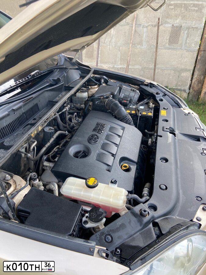 Фото автомобиля TOYOTA RAV4, 2010 — госномер К010ТН36. Цвет: БЕЖЕВЫЙ