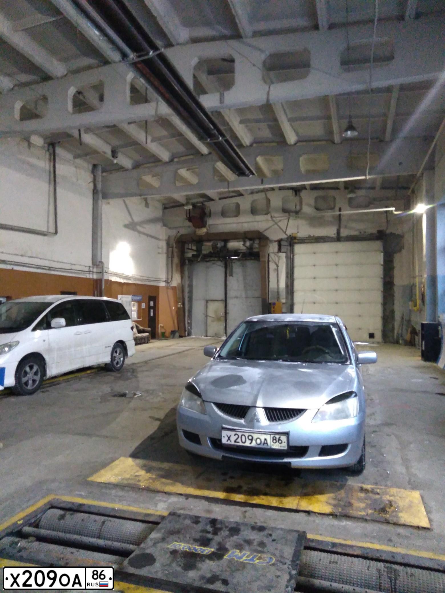 Фото автомобиля MITSUBISHI LANCER, 2005. Цвет: Серебристый