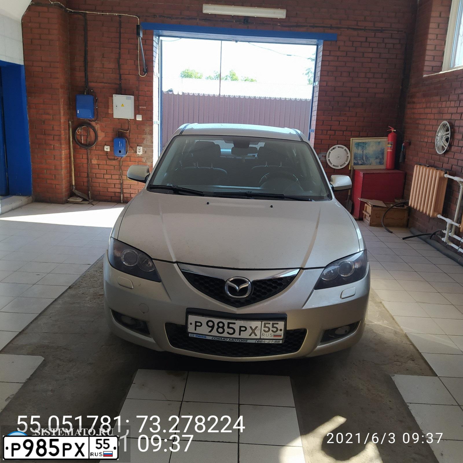 Фото автомобиля MAZDA 3, 2006 — госномер Р985РХ55. Цвет: СЕРО-ЗОЛОТИСТЫЙ