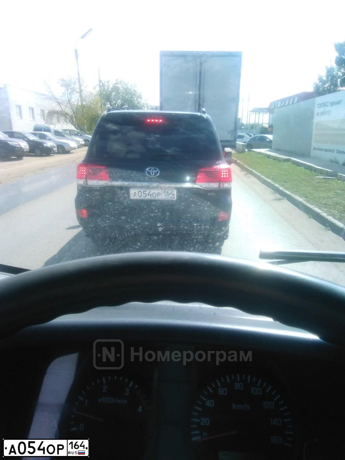 Фото автомобиля TOYOTA LANDCRUISER 200, 2016 — госномер А054ОР164. Цвет: ЧЕРНЫЙ
