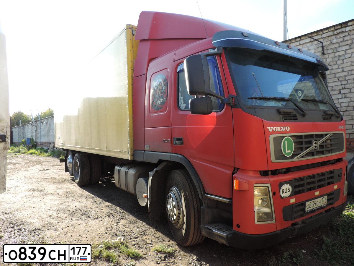 Фото автомобиля VOLVO SERIE FM /6X4/, 2002 — госномер С128АР40. Цвет: КРАСНЫЙ
