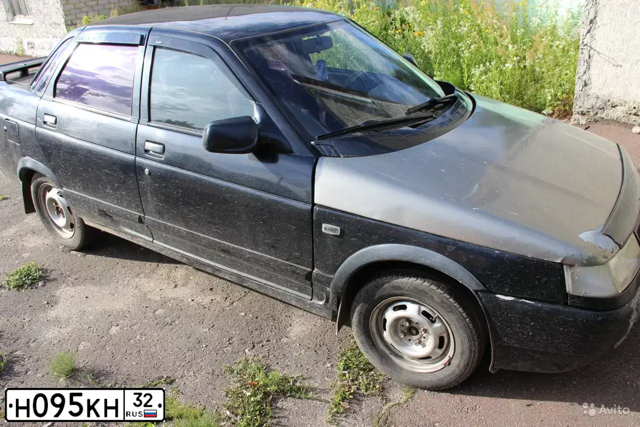 Фото автомобиля LADA 2110, 2004 — госномер Н095КН32. Цвет: ГРАФИТОВЫЙ МЕТАЛЛИК