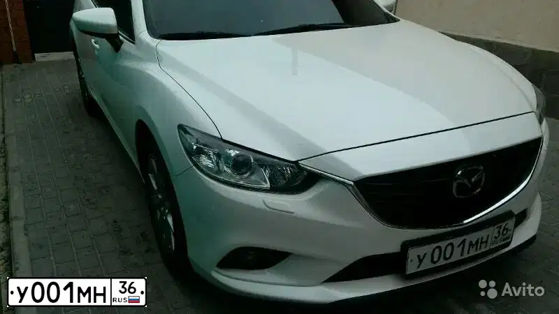 Фото автомобиля MAZDA 6, 2014 — госномер У001МН36. Цвет: Белый