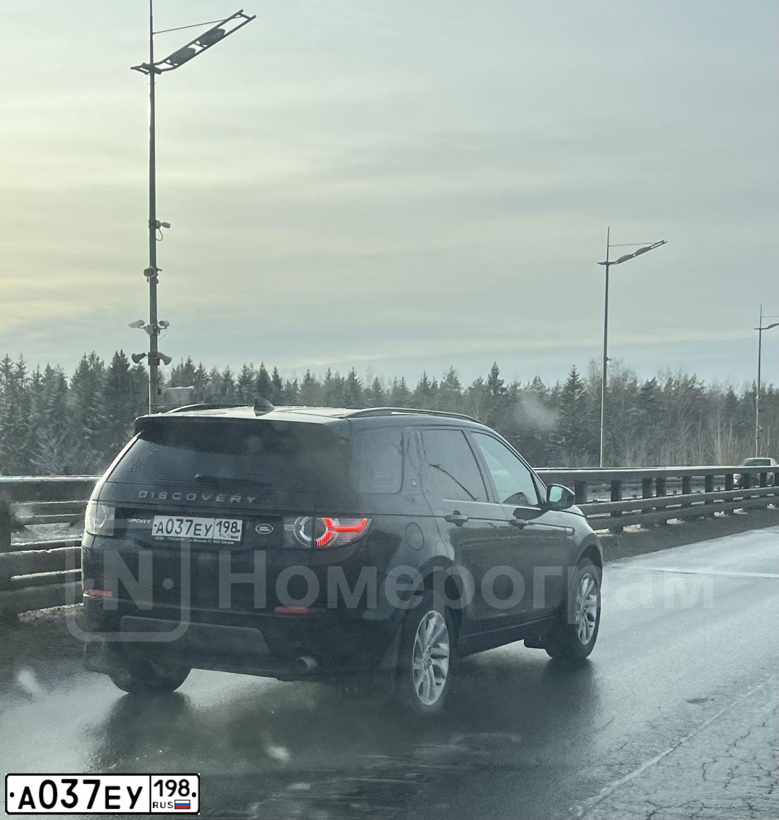 Фото автомобиля LANDROVER DISCOVERY SPORT, 2018 — госномер А037ЕУ198. Цвет: ЧЕРНЫЙ