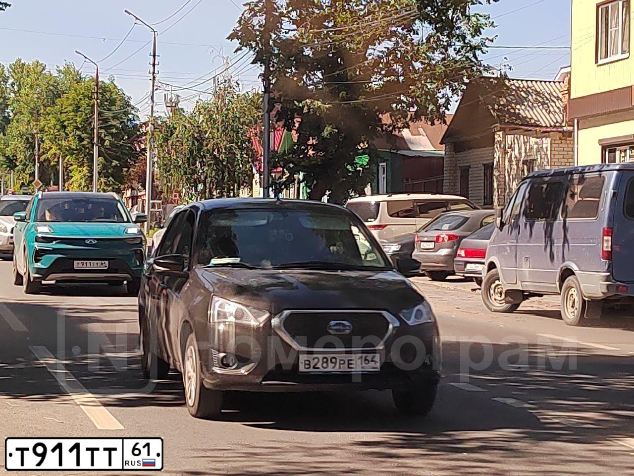 Фото автомобиля HYUNDAI SANTA FE, 2012 — госномер Т911ТТ61. Цвет: ЧЕРНЫЙ