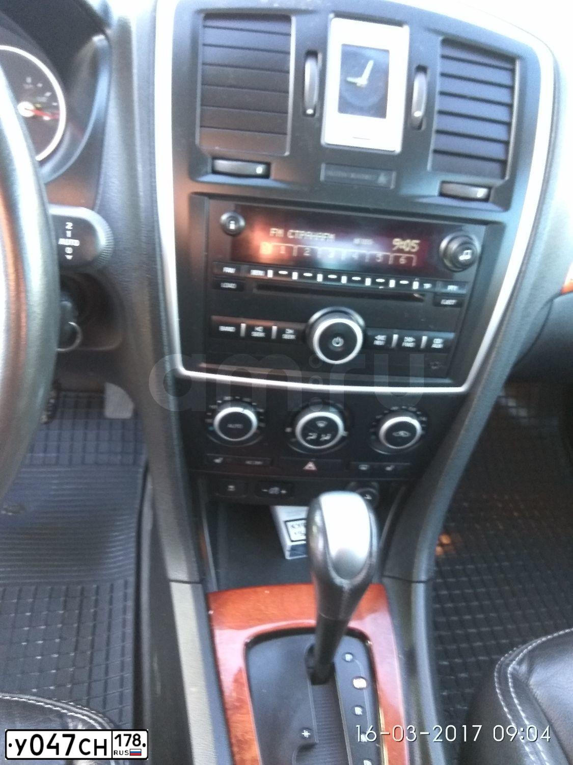 Фото автомобиля CADILLAC C BLS, 2006 — госномер Е552ЕА198. Цвет: СЕРЫЙ
