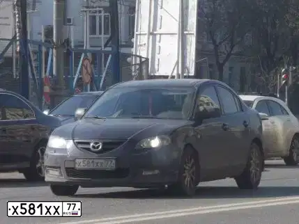 Фото автомобиля MAZDA 3, 2008 — госномер Х581ХХ77. Цвет: СИНИЙ ТЕМНЫЙ