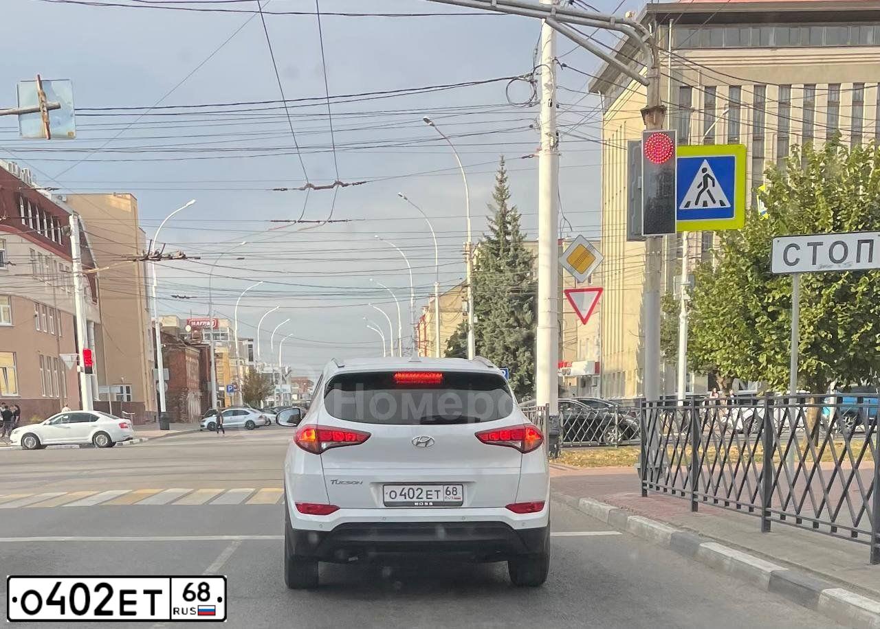 Фото автомобиля HYUNDAI TUCSON, 2018 — госномер О402ЕТ68. Цвет: БЕЛЫЙ