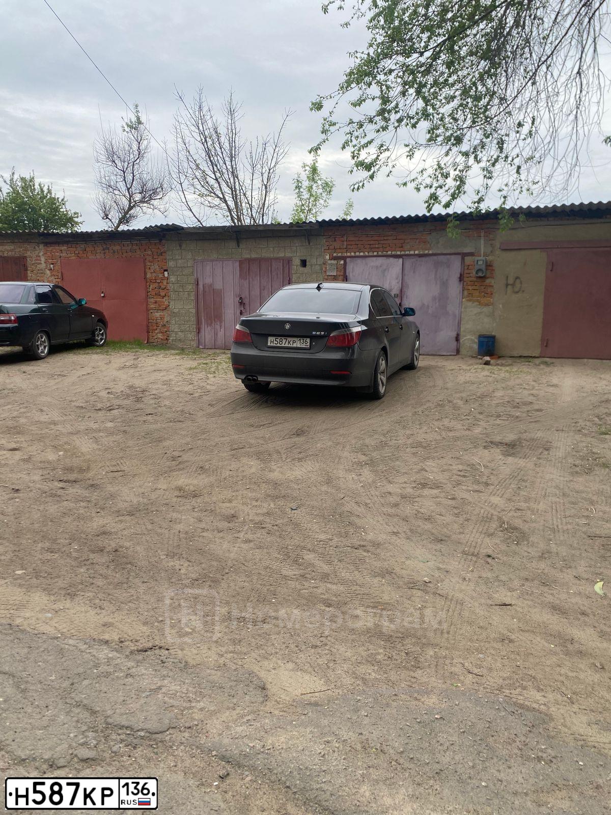 Фото автомобиля БМВ 523I, 2006 — госномер Н587КР136. Цвет: ЧЕРНЫЙ
