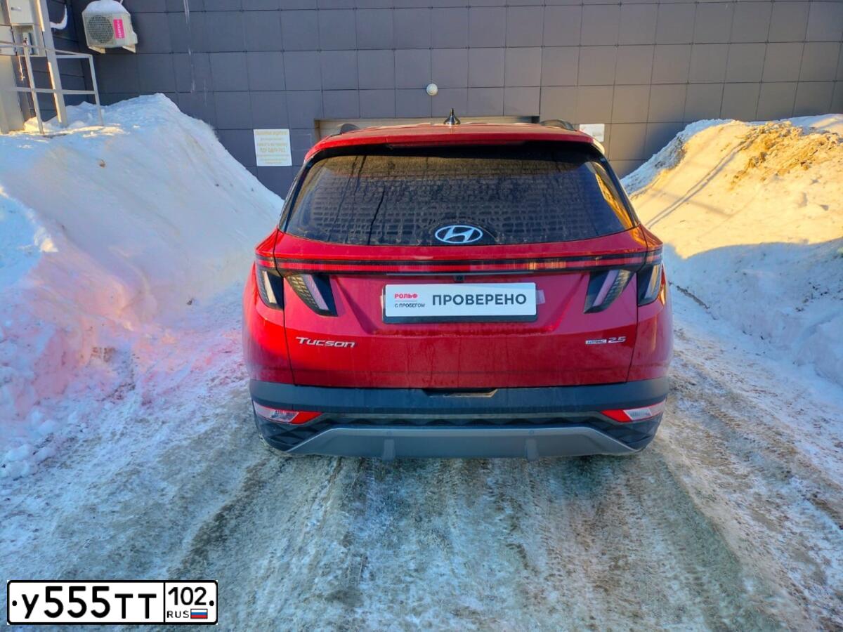 Фото автомобиля HYUNDAI TUCSON, 2022 — госномер Н312ЕС977. Цвет: Красный