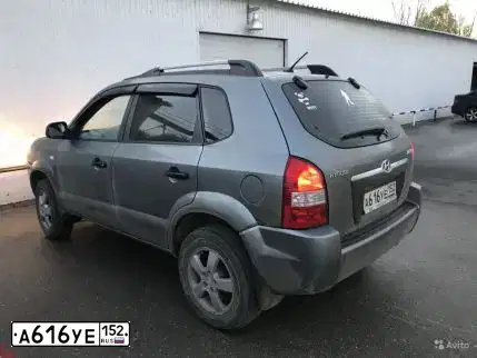 Фото автомобиля HYUNDAI TUCSON, 2008 — госномер Х937РН33. Цвет: ТЕМНО-СЕРЫЙ
