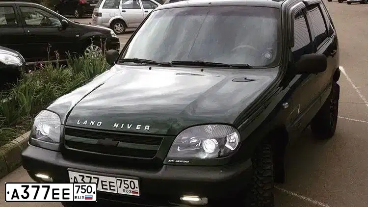 Фото автомобиля CHEVROLET NIVA, 2005 — госномер О775СК761. Цвет: ЗЕЛЕНЫЙ ТЕМНЫЙ