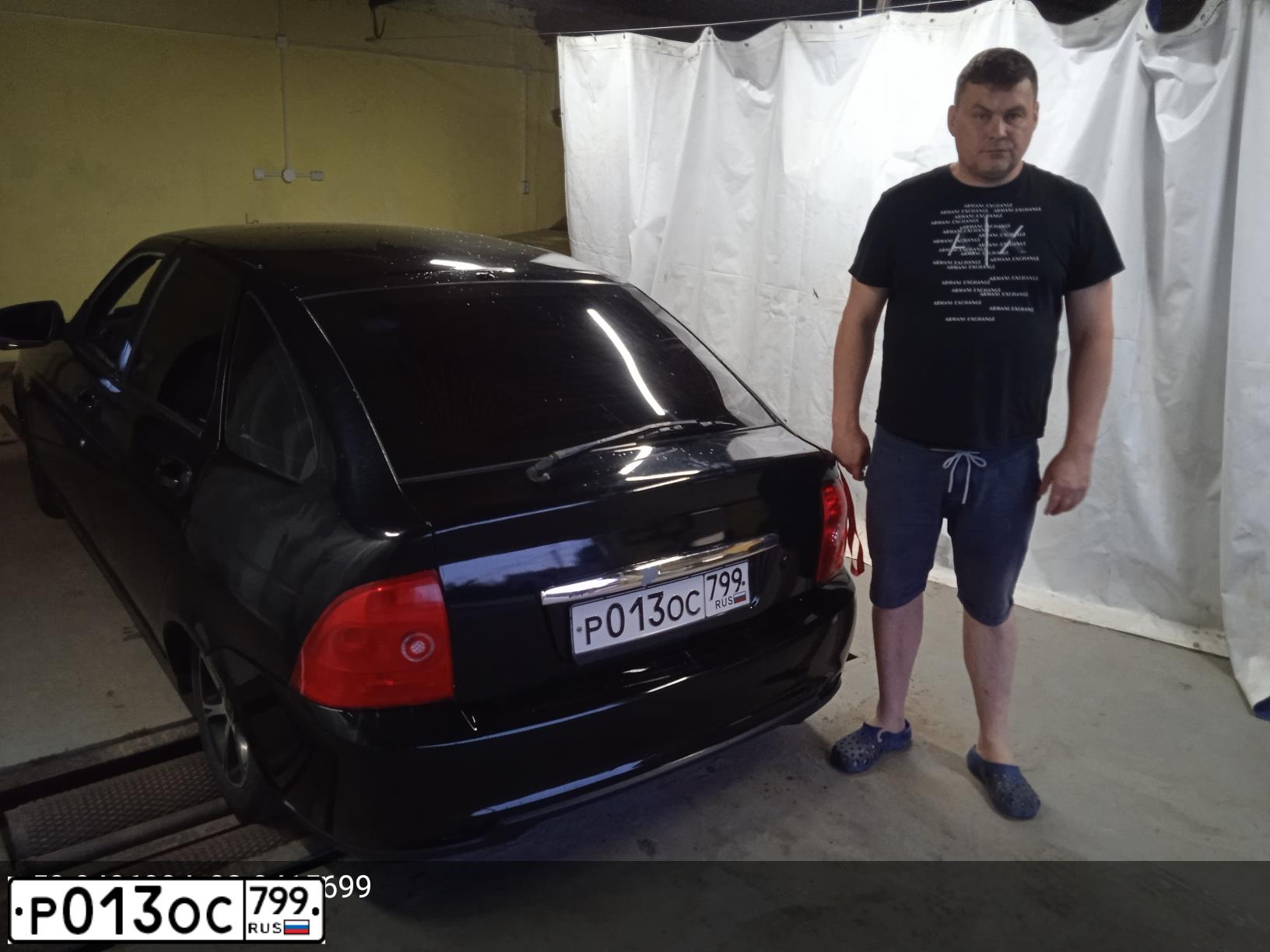 Фото автомобиля LADA 2172 PRIORA, 2010 — госномер Р013ОС799. Цвет: СИНЕ-ЧЕРНЫЙ